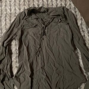 Shirt with strings in front